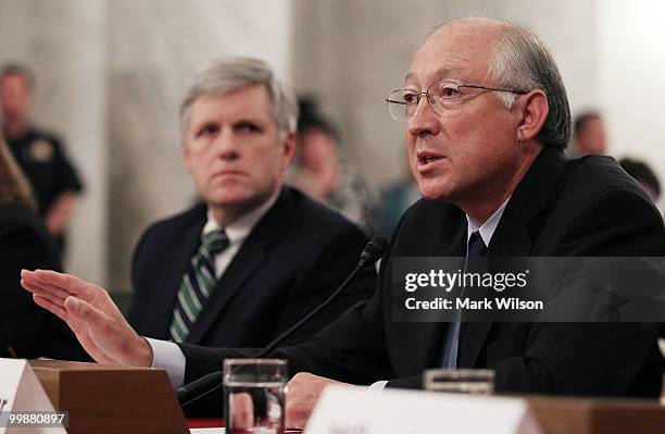 Interior Secretary Ken Salazar testifies while flanked by Deputy Interior Secretary David Hayes , during a Senate Energy and Natural Resources...