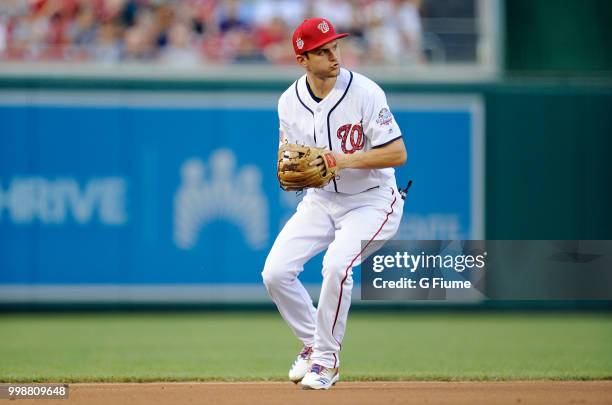 Trea Turner of the Washington Nationals throws the ball to first base against the Boston Red Sox at Nationals Park on July 3, 2018 in Washington, DC.