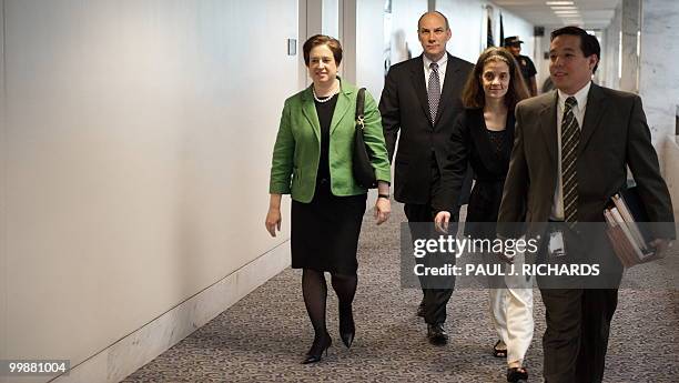 Supreme Court nominee Solicitor General Elena Kagan walks the hallways on her way to meet with Texas Republican Senator John Cornyn at his Capitol...