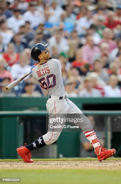 Mookie Betts of the Boston Red Sox bats against the Washington Nationals at Nationals Park on July 3, 2018 in Washington, DC.