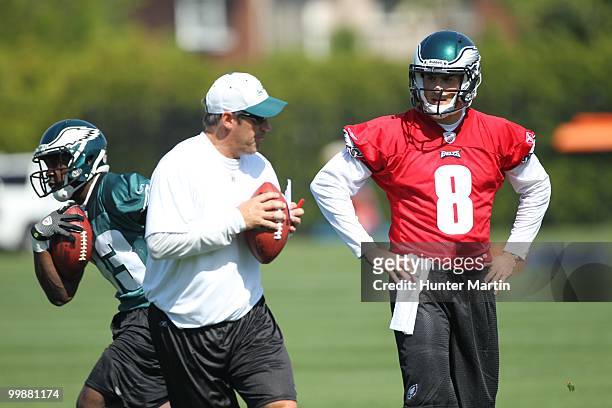 Quarterback Mike Kafka of the Philadelphia Eagles is coached by quarterbacks coach Doug Pederson during mini-camp practice on April 30, 2010 at the...