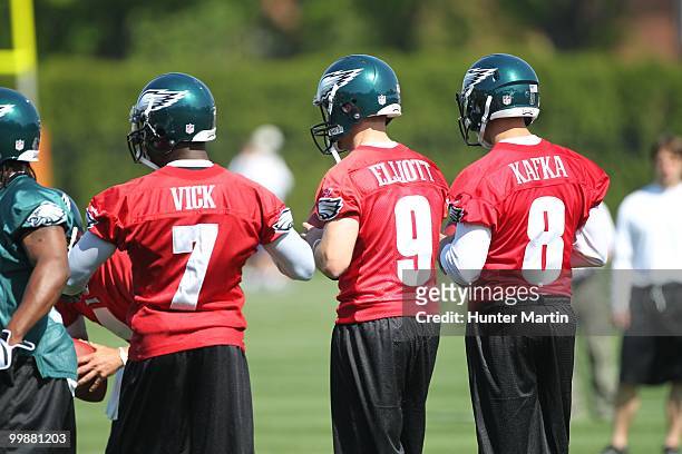 Quarterbacks Michael Vick, Joey Elliott and Mike Kafka of the Philadelphia Eagles participate in drills during mini-camp practice on April 30, 2010...