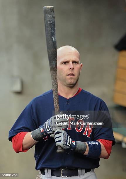 Dustin Pedroia of the Boston Red Sox looks on from the dugout during the game against the Detroit Tigers at Comerica Park on May 14, 2010 in Detroit,...