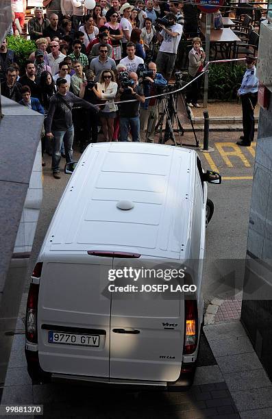 Van departs with the bodies of two murdered British children from a hotel in Lloret de mar on May 18, 2010. Spanish police today detained a British...