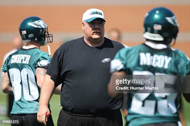 Head coach Andy Reid of the Philadelphia Eagles watches practice during mini-camp on April 30, 2010 at the NovaCare Complex in Philadelphia,...