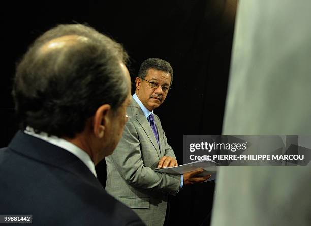 President of Dominican Republic's Leonel Fernandez waits before giving a jointed press conference with Haiti's Prime Minister Jean Max Bellerive...