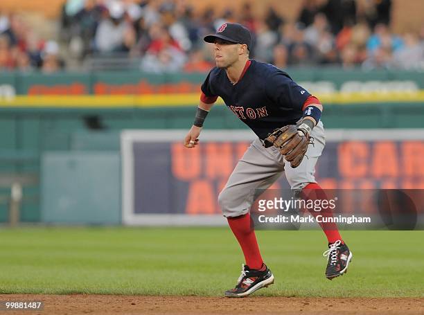 Dustin Pedroia of the Boston Red Sox fields against the Detroit Tigers during the game at Comerica Park on May 14, 2010 in Detroit, Michigan. The Red...
