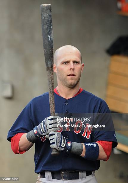 Dustin Pedroia of the Boston Red Sox looks on from the dugout during the game against the Detroit Tigers at Comerica Park on May 14, 2010 in Detroit,...