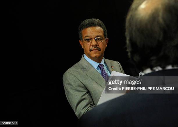 President of Dominican Republic's Leonel Fernandez waits before giving a jointed press conference with Haiti's Prime Minister Jean Max Bellerive...