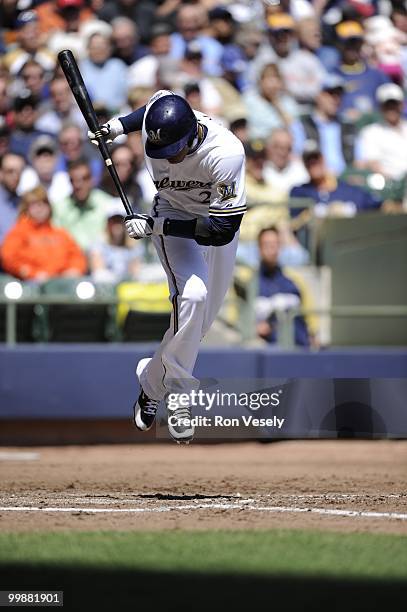Alcides Escobar of the Milwaukee Brewers jumps out of the way of an inside pitch against the Pittsburgh Pirates on April 28, 2010 at Miller Park in...