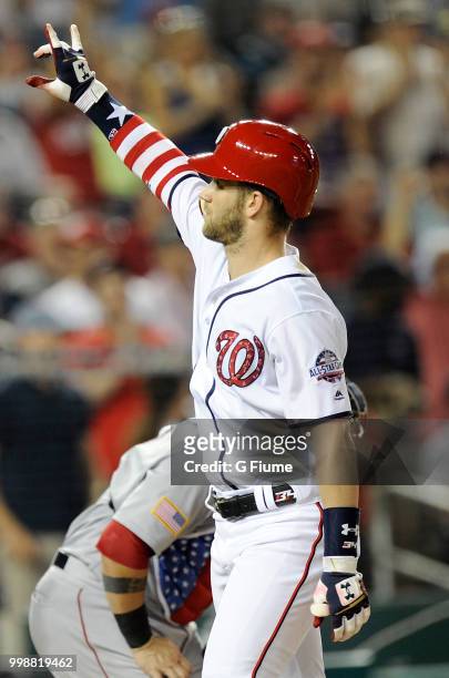 Bryce Harper of the Washington Nationals celebrates after hitting a home run in the eighth inning against the Boston Red Sox at Nationals Park on...
