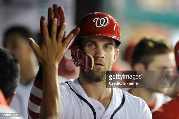 Bryce Harper of the Washington Nationals celebrates after hitting a home run in the eighth inning against the Boston Red Sox at Nationals Park on...