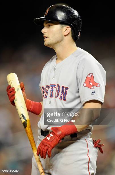 Andrew Benintendi of the Boston Red Sox walks to the dugout during the game against the Washington Nationals at Nationals Park on July 2, 2018 in...