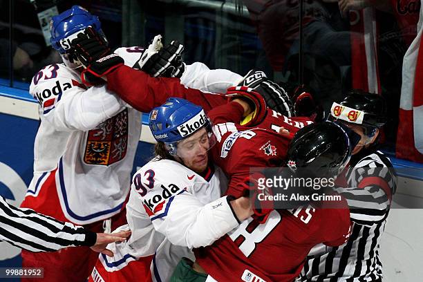 Ondrej Nemec and Jakub Voracek of Czech Republic fight with Corey Perry and Brent Burns of Canada during the IIHF World Championship group F...