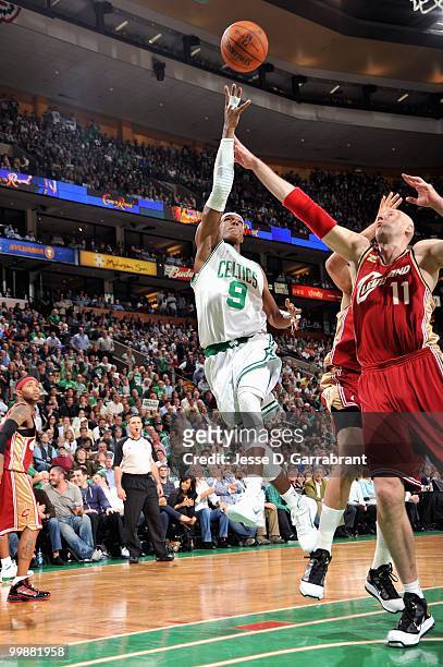 Rajon Rondo of the Boston Celtics puts a shot up over Zydrunas Ilguaskas of the Cleveland Cavaliers in Game Six of the Eastern Conference Semifinals...