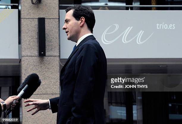 British Chancellor of the Exchequer George Osborne answers during the joint press conference after an Economic and Financial Affairs on May 18, 2010...