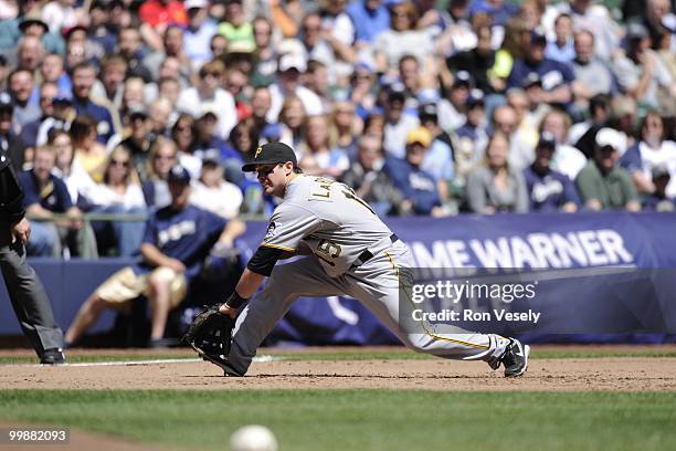 Andy LaRoche of the Pittsburgh Pirates fields against the Milwaukee Brewers on April 28, 2010 at Miller Park in Milwaukee, Wisconsin. The Pirates...