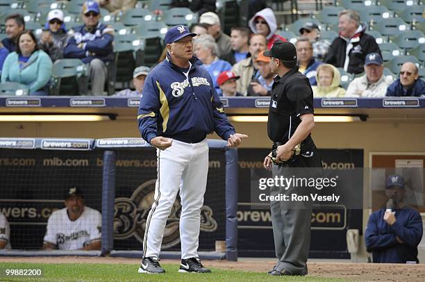 Manager Ken Macha of the Milwaukee Brewers talks to home plate umpire D.J. Reyburn during the game against the Pittsburgh Pirates on April 28, 2010...