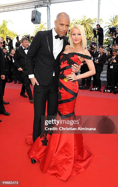 Personalities Xavier Delarue and Tatiana Laurens Delarue attend the 'Of Gods and Men' Premiere held at the Palais des Festivals during the 63rd...