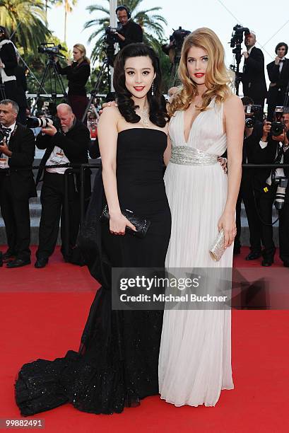 Model Doutzen Kroes and actress of Fan Bing Bing attends the "Of Gods And Men" Premiere at the Palais des Festivals during the 63rd Annual Cannes...