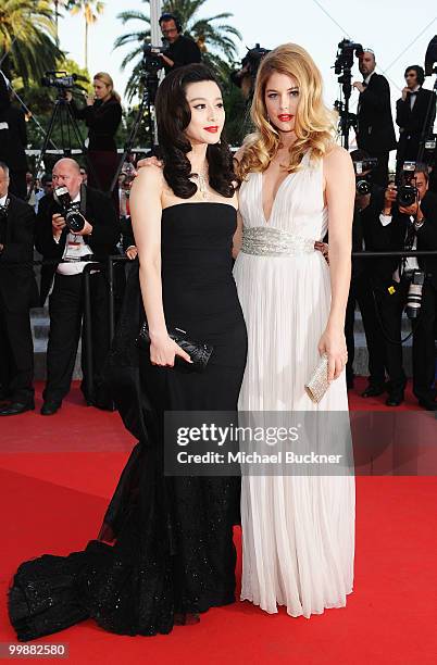 Model Doutzen Kroes and actress Fan Bing Bing attends the "Of Gods And Men" Premiere at the Palais des Festivals during the 63rd Annual Cannes Film...