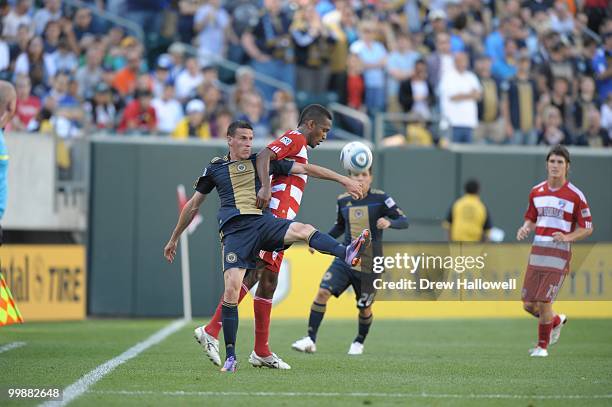 Sebastien Le Toux of the Philadelphia Union and Atiba Harris of FC Dallas play the ball during the game against FC Dallas on May 15, 2010 at Lincoln...