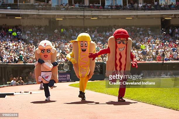 Onion, Mustard and Ketchup race during the Hot Dog Derby during the game with the Tampa Bay Rays and the Cleveland Indians at Progressive Field on...