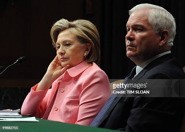 Secretary of State Hillary Clinton testifies before the Senate Foreign Relations Committee hearing on the new Strategic Arms Reduction Treaty along...
