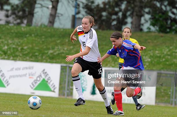 Germany's Fabienne Dongus battles against Anais Messager of France during the U16 women international friendly match between France and Germany at...