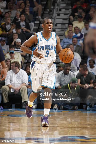 Chris Paul of the New Orleans Hornets dribbles the ball downcourt against the Cleveland Cavaliers on March 24, 2010 at the New Orleans Arena in New...
