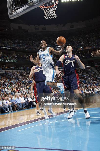 Marcus Thornton of the New Orleans Hornets makes a layup against the Cleveland Cavaliers on March 24, 2010 at the New Orleans Arena in New Orleans,...