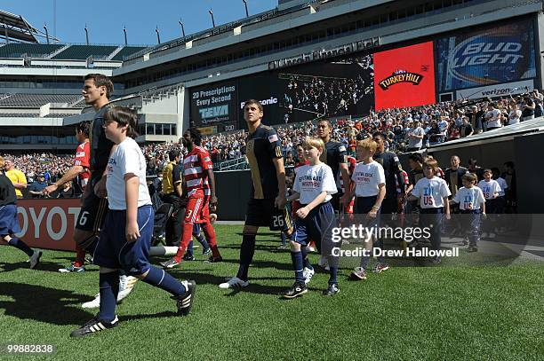 The Philadelphia Union walk out onto the field during the game against FC Dallas on May 15, 2010 at Lincoln Financial Field in Philadelphia,...