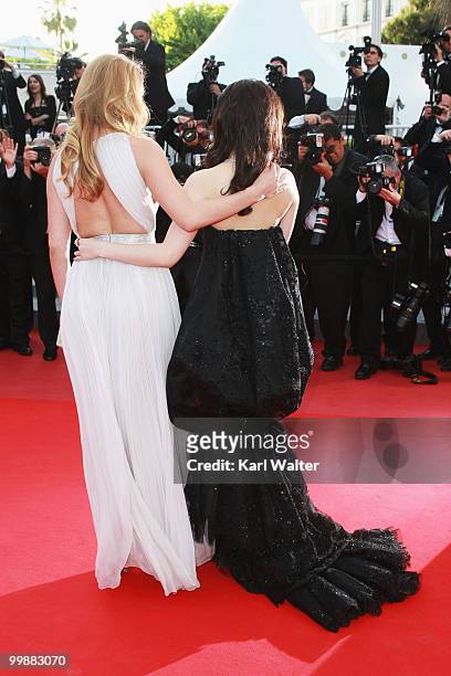 Model Doutzen Kroes and actress Fan Bing Bing attends the "Of Gods And Men" Premiere at the Palais des Festivals during the 63rd Annual Cannes Film...