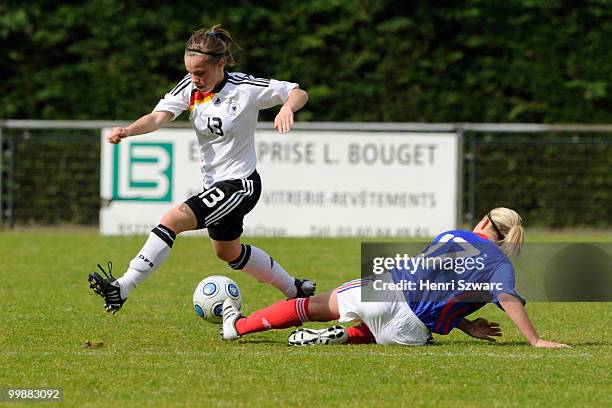 Germany's Jil Urbas battles for the ball with France's Meryll Wenger during the U16 women international friendly match between France and Germany at...