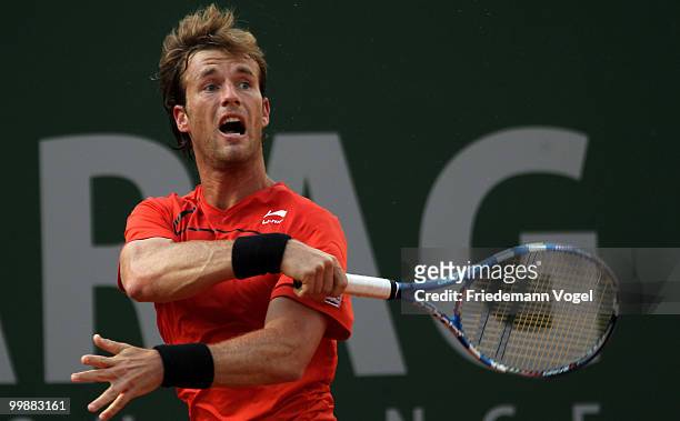 Daniel Gimeno-Traver of Spain plays a backhand during his match against Sam Querrey of USA during day three of the ARAG World Team Cup at the...