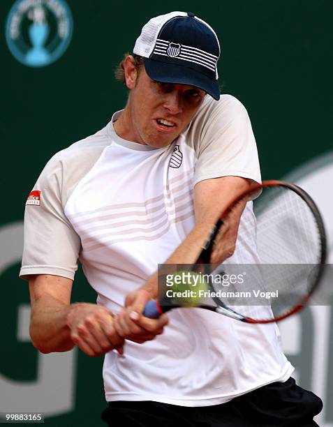 Sam Querrey of USA plays a backhand during his match against Daniel Gimeno-Traver of Spain during day three of the ARAG World Team Cup at the...