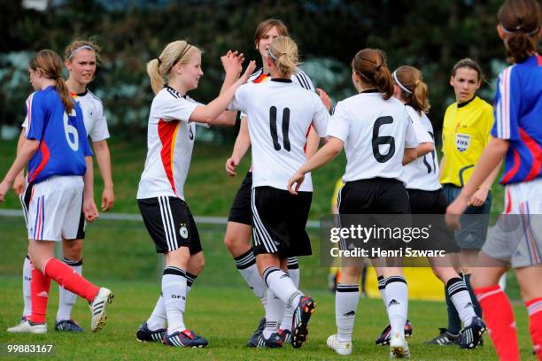 Germany's player celebrate after Selina Hunerfauth scores the 1-0 winning goal during the U16 women international friendly match between France and...