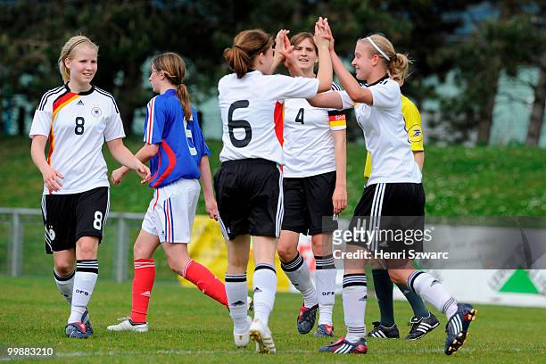 Germany's player celebrate after Selina Hunerfauth scores the 1-0 winning goal during the U16 women international friendly match between France and...