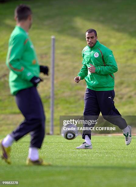 Algerian team captain Yazid Mansouri warms up during a practice session on May 18, 2010 in the Swiss Alpine resort of Crans-Montana ahead of the FIFA...