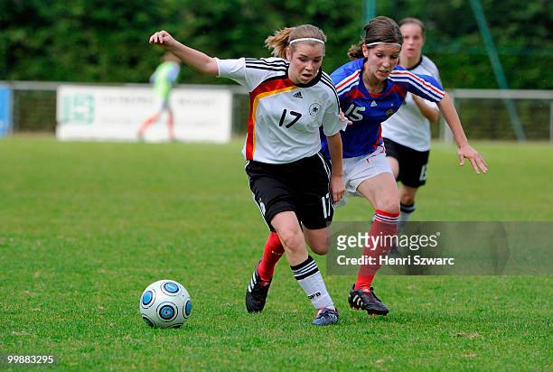Germany's Linda Dallmann battles against France's Chauverg Devlees during the U16 women international friendly match between France and Germany at...