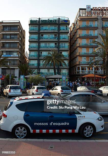 Police gather outside the Hotel Miramar where two children, believed to be British, have been found dead in a hotel room on May 18, 2010 in the Costa...