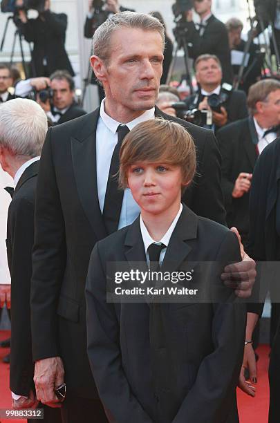 Actor Lambert Wilson and guest attend the "Of Gods And Men" Premiere at the Palais des Festivals during the 63rd Annual Cannes Film Festival on May...