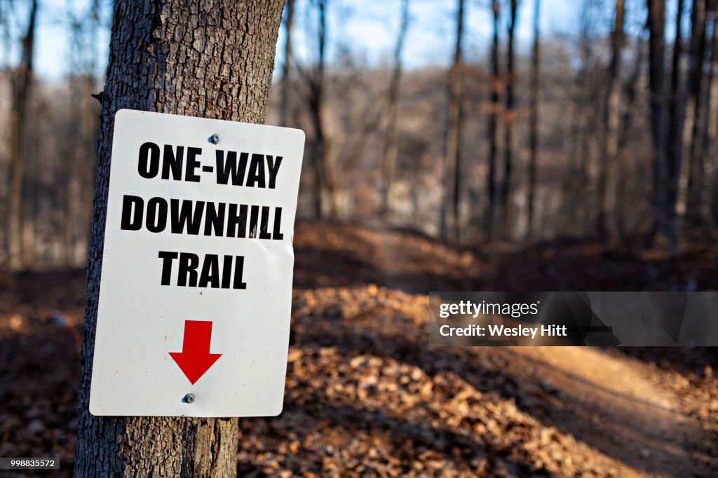 Sign for the downhill mountain biking trail in Northwest Arkansas