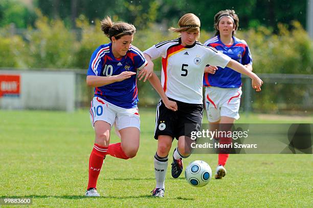 Franziska Brokl of Germany battles for the ball with Claire Lavogez of France during the U16 Women international friendly match between France and...