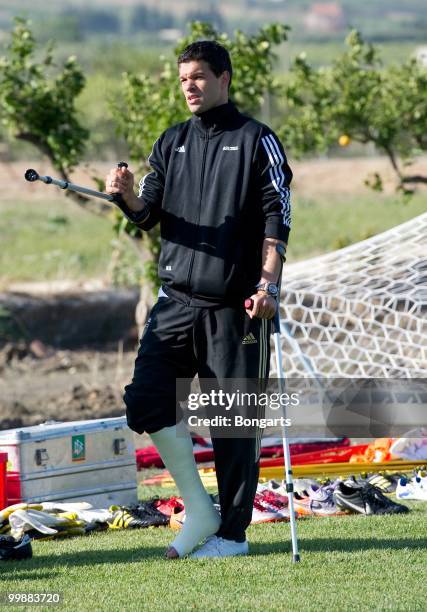 Injured Michael Ballack attends his team's training session on crutches at Verdura Golf & Spa Resort on May 18, 2010 in Sciacca, Italy.