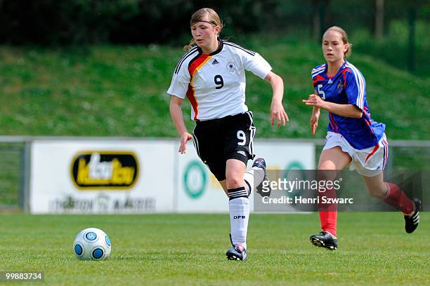 Saskia Toporski of Germany runs with the ball during the U16 Women international friendly match between France and Germany at Parc des Sports stadium...