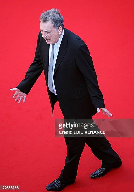 British director Stephen Frears leaves after the screening of "Tamara Drewe" presented out of competition at the 63rd Cannes Film Festival on May 18,...