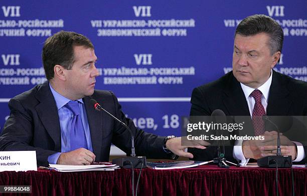 Russian President Dmitry Medvedev speaks with his Ukrainian counterpart Viktor Yanukovych during the seventh Ukraine - Russia Economic Forum in Kiev,...