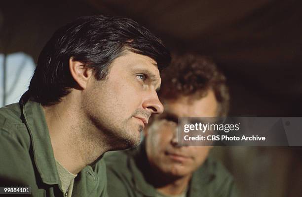 American actors Alan Alda , as Captain Benjamin Hawkeye Pierce, and Wayne Rogers, as Captain Trapper John McIntyre, in a scene from an episode of the...