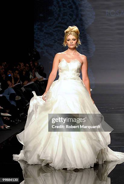 Mischa Barton presents a creation from Rosa Clara's latest bridal collection 2011, at the Fira 2 Barcelona on May 18, 2010 in Barcelona, Spain.